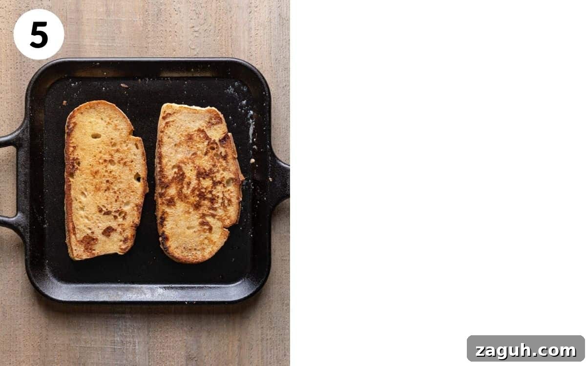 Sourdough French Toast Recipe with Crispy Edges and Custardy Center 6 finished french toast sourdough on skillet