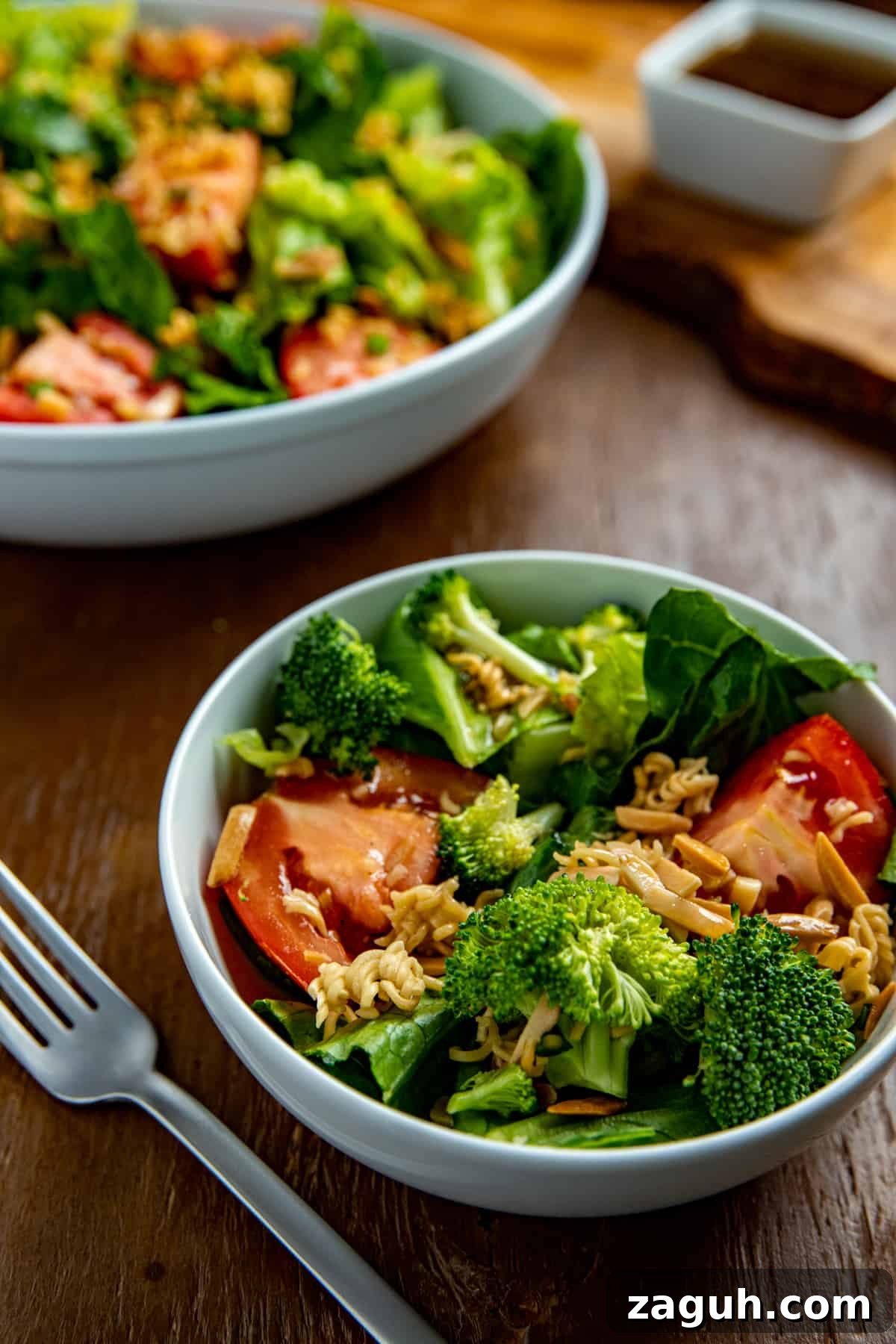 Asian Ramen Salad with Crunchy Vegetables and Sesame Dressing 5 finished salad in two white salad bowl
