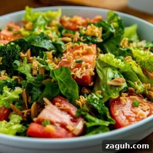Asian Ramen Salad with Crunchy Vegetables and Sesame Dressing 6 finished salad in white bowl