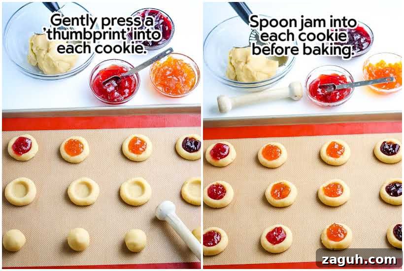 Strawberry Jam Thumbprint Cookies: Soft, Fruity Recipe 5 thumbprint cookies being filled with jam on a baking sheet