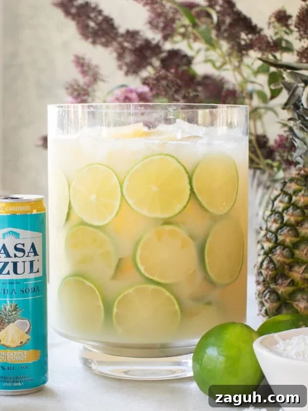 Sparkling Cherry Punch Recipe for Parties and Summer Gatherings 10 Tequila punch recipe with pineapple and coconut.