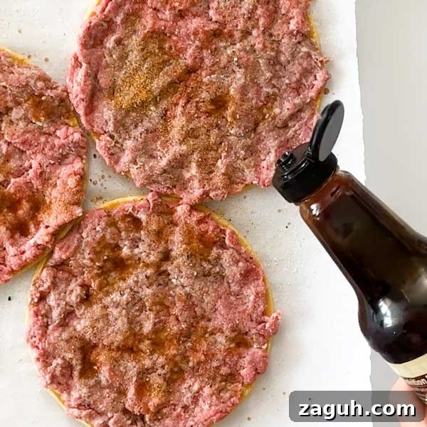 Gluten-Free Big Mac Smashed Tacos Recipe That Went Viral 9 Sprinkling Worcestershire sauce on top of ground beef spread on corn tortillas.