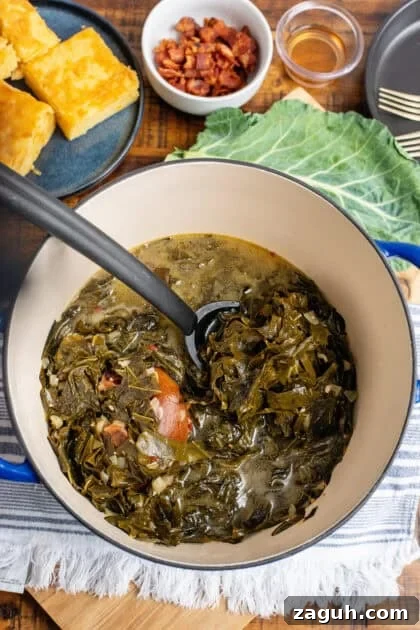 Authentic Southern Collard Greens Recipe That Melts in Your Mouth 14 Delicious collard greens in a Dutch oven ready to eat.