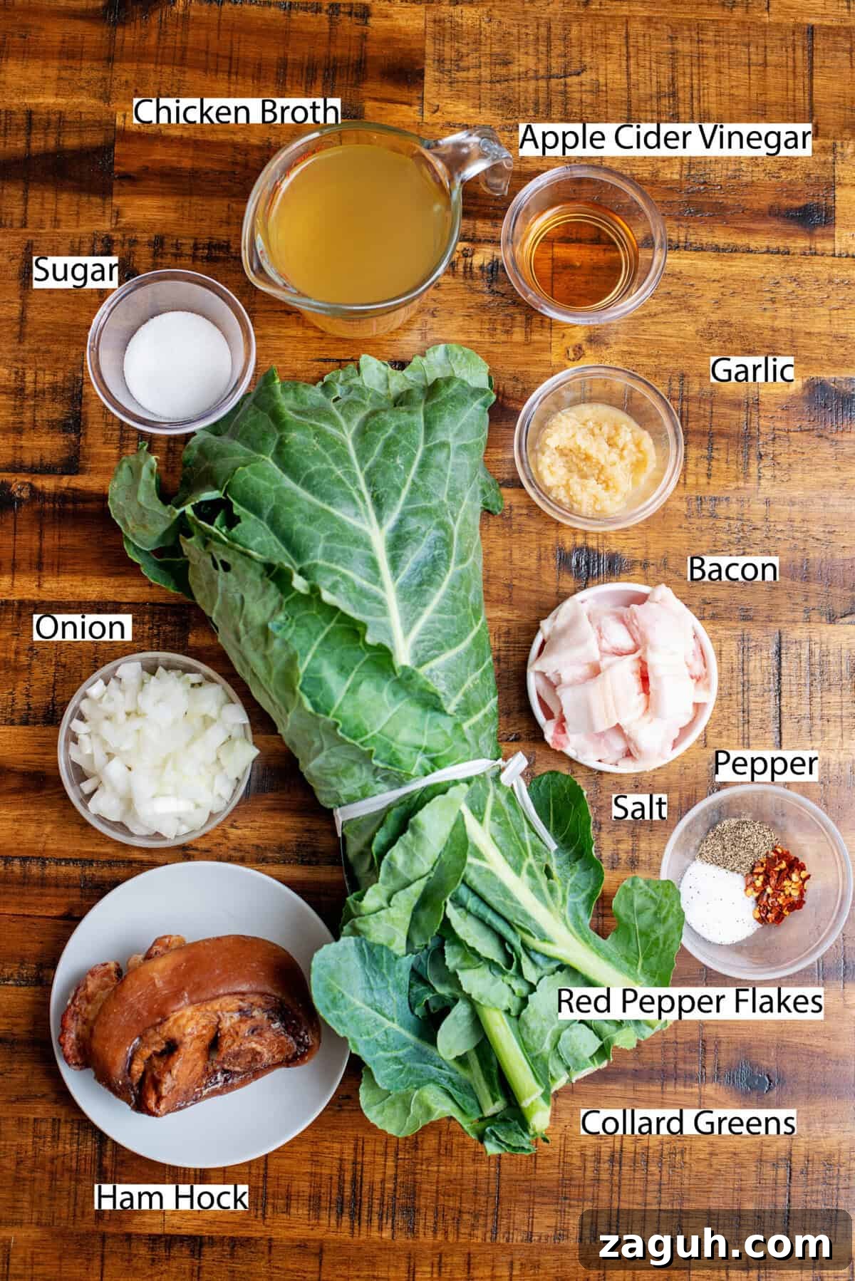 Authentic Southern Collard Greens Recipe That Melts in Your Mouth 3 Ingredients for collard greens recipe on a wooden surface.