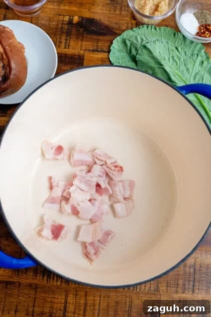Authentic Southern Collard Greens Recipe That Melts in Your Mouth 8 Bacon sizzling in a Dutch oven.