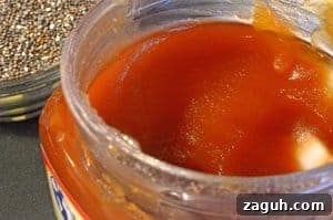 a bottle of all natural honey.