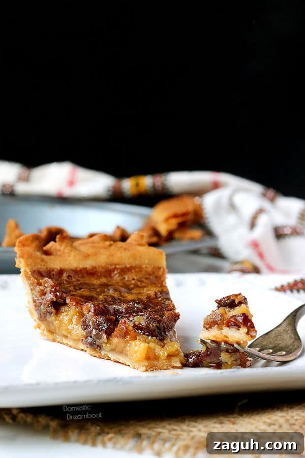Decadent Butter Tart Pie Recipe: Classic Canadian Dessert 5 Slice of butter tart pie and a fork on a plate