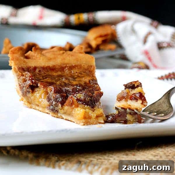 Decadent Butter Tart Pie Recipe: Classic Canadian Dessert 6 Slice of butter tart pie and a fork on a plate